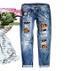 European and American cross border AliExpress trendy Halloween pumpkin ripped print jeans for women mid rise straight leg pants